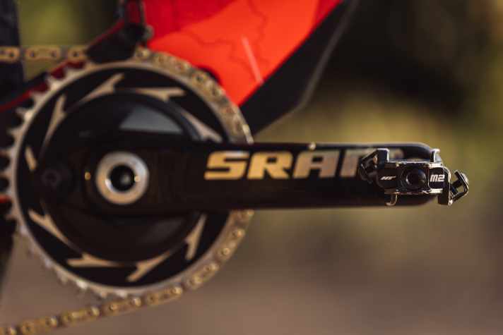 Lightweight HT race pedals on Filippo Colombo's bike transfer the energy to a Sram power meter.