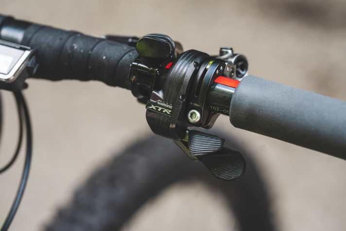 Old: The old Shimano XTR Di2 shifting lever's electronic inner workings were noticeable to the touch.