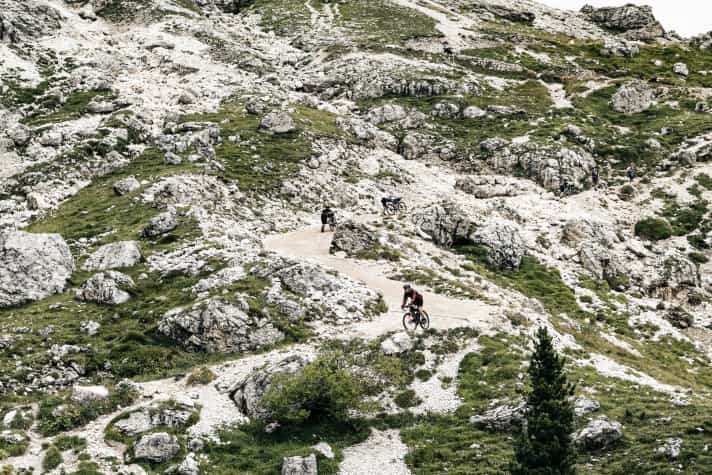In the big mountains, the cyclists seem very small