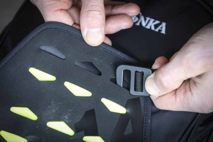 Helmets or pads can also be attached to the front drawer, but the hooks are a little awkward to handle.