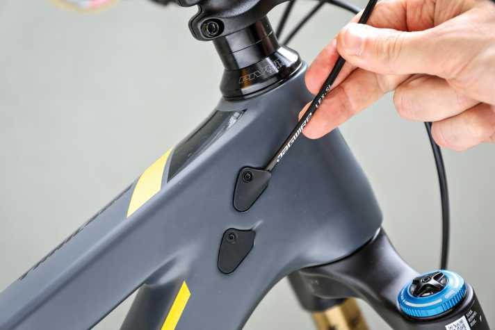 Without a tension guide in the frame, installing the outer shell can become a game of patience