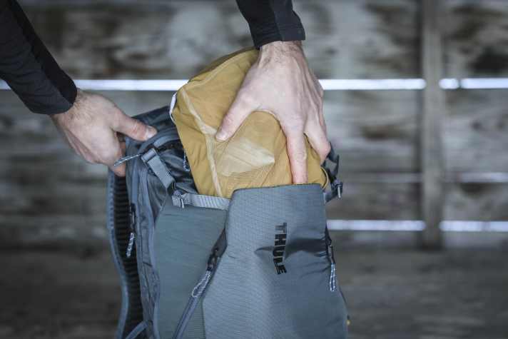 Quickly accessible items such as a rain jacket can be stored in the large drawer.