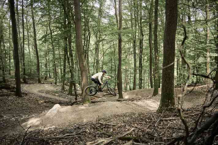 Before the trail park opens, Max Mey tests the airtime sections on the already completed beech bounce trail.