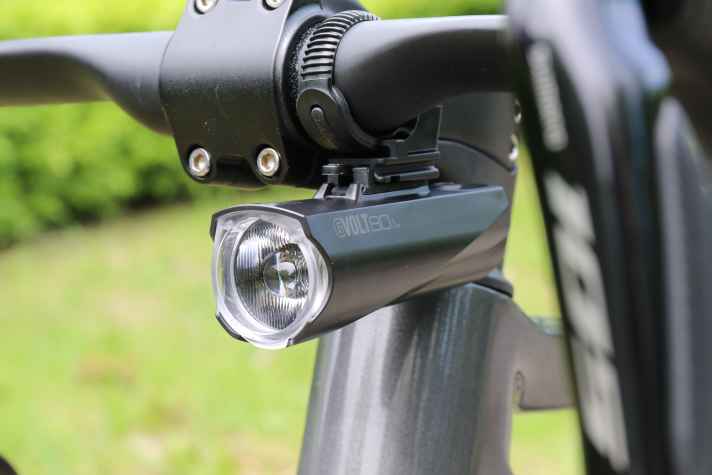 Mounting under the handlebars saves space and ensures a tidy appearance.