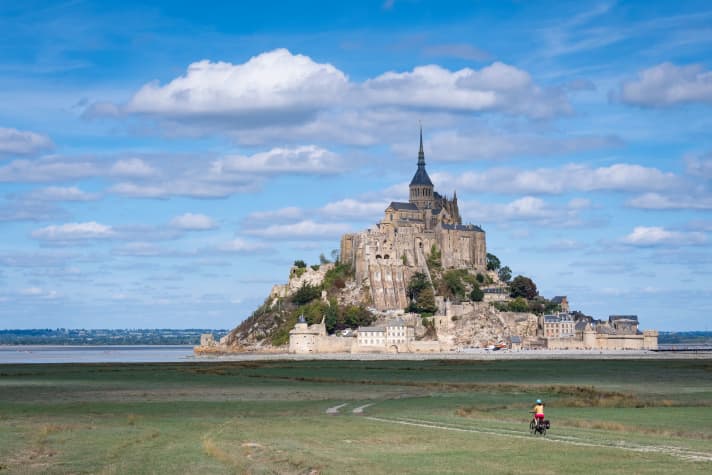Mont Saint-Michel rises impressively out of the sea.