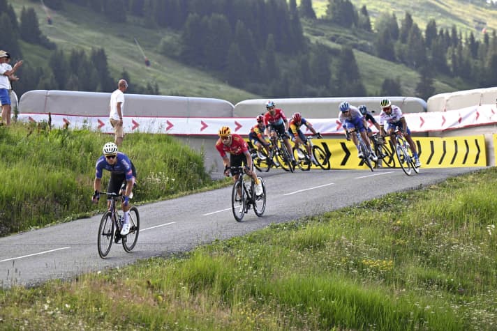 Cushioned: securing a bend at the Tour de France.