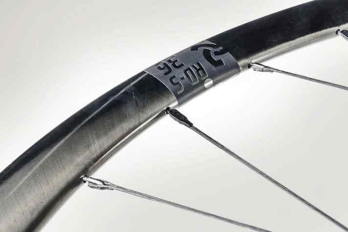 Hooked in: Specially moulded titanium tabs hold the spokes in a conventional rim.