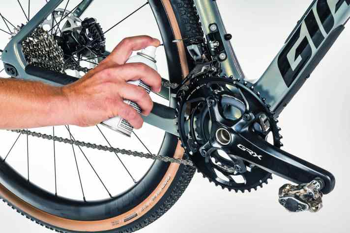 The first tip is relatively simple, but often effective: mist the area around the front derailleur, cranks and chainrings with spray wax if the noise seems to be coming from these components.