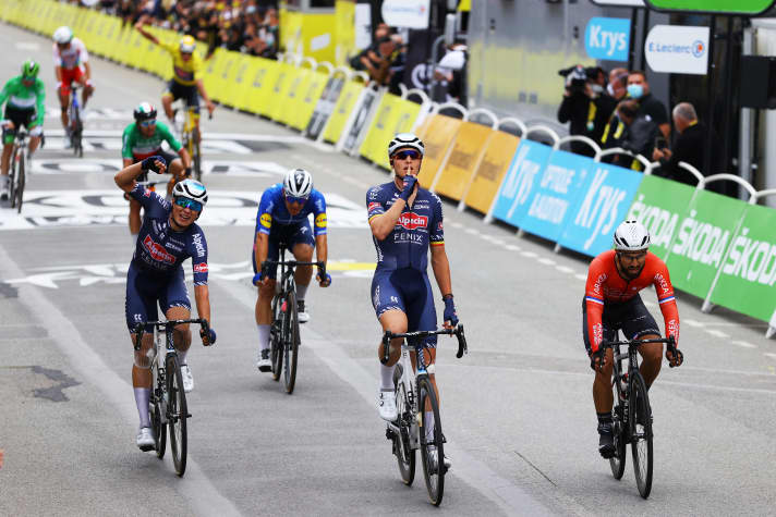 Tim Merlier (centre) and Jasper Philipsen (left) formed a sprint tandem at the 2021 Tour de France.