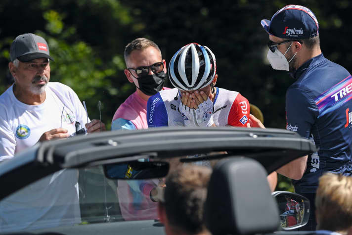 Thibaut Pinot has to collect himself after a blow to the face