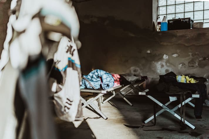 Bedroom: There is barely an hour to rest on the camp beds in our garage between jobs.