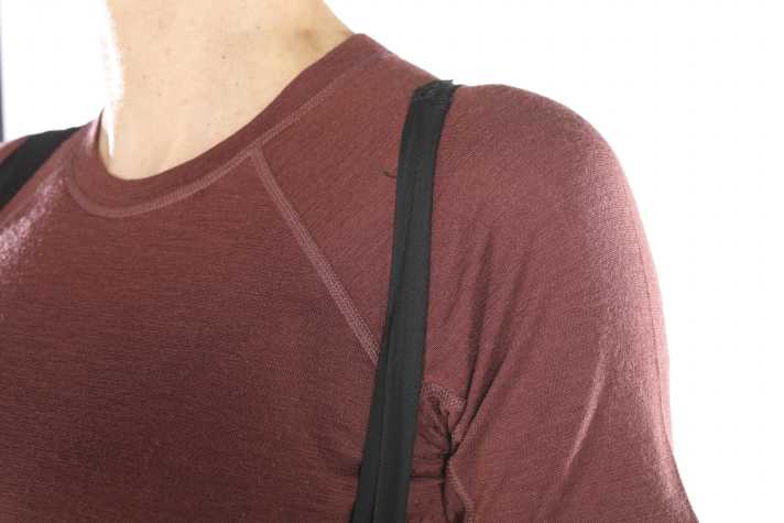 Wider would have been better here. The narrow straps roll up and press on the shoulders