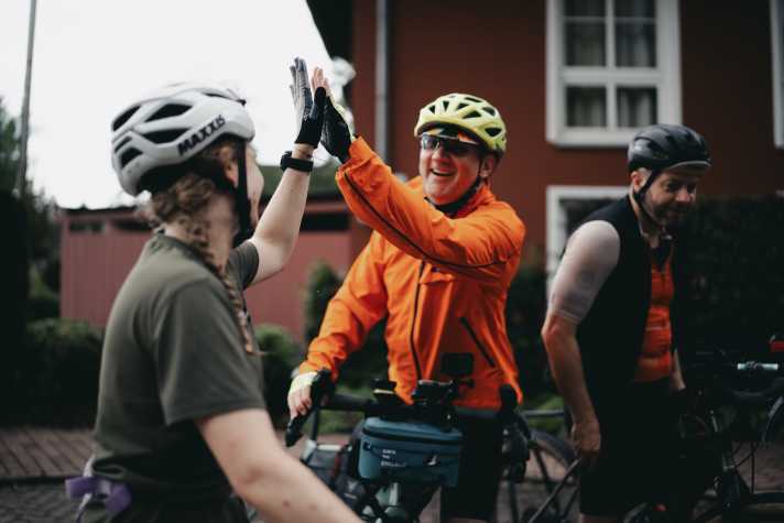 Clapping your hands after a day on the bike together
