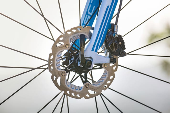   Cooling fins on pads and disc dissipate braking heat.