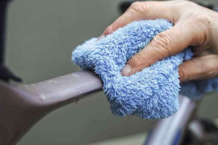 To prevent water stains, at least "leather" the frame with a microfibre cloth