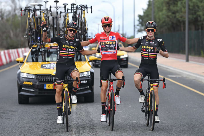 The victorious three. The team jersey with the three coloured stripes signals the victories in the Giro, Tour and Vuelta this year