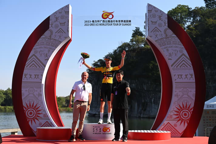 Olav Kooij celebrates a stage win at the Tour of Giangxi on his second birthday