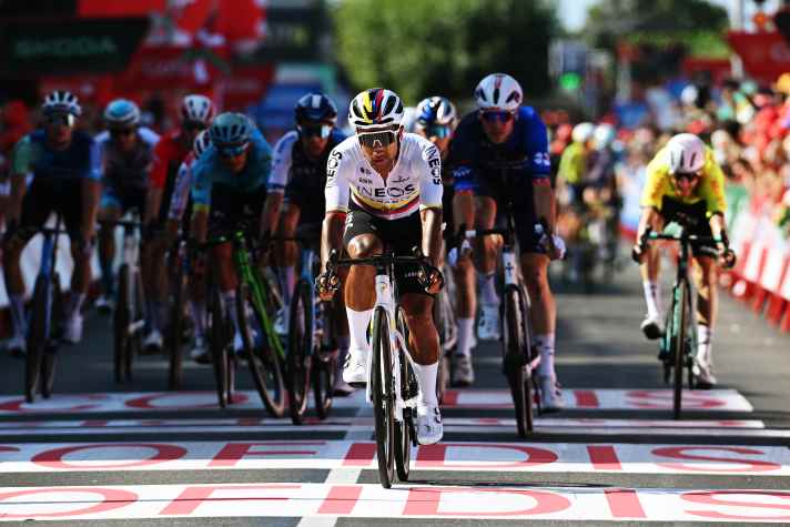 The peloton reaches the finish around five and a half minutes behind van Aert