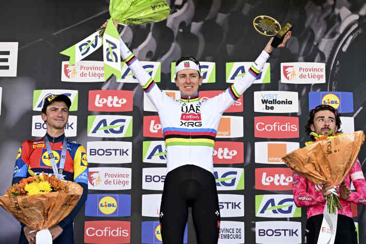 Tadej Pogacar (centre) wins Liège-Bastogne-Liège 2025 ahead of Giulio Ciccone (left) and Ben Healy (right)