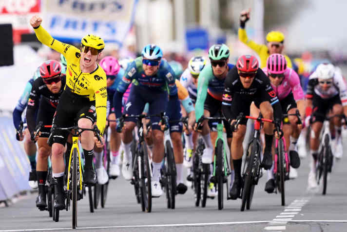 Brennan celebrates as winner at the finish in Kuurne