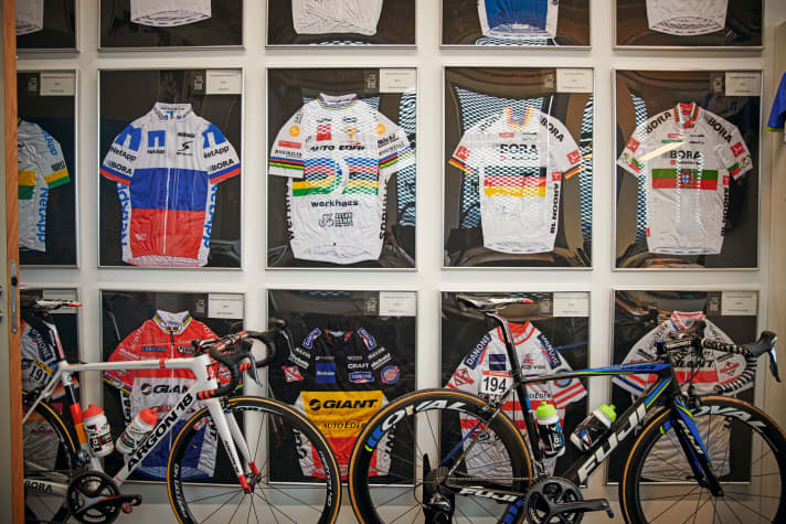 Many trophies and team bikes can be seen in the control centre of Ralph Denk's team