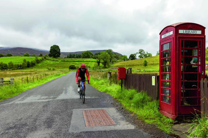 Isolated: In the hills of Cateran, at the foot of the Cairngorms, the hustle and bustle is far away - the phone box is now a bookcase.