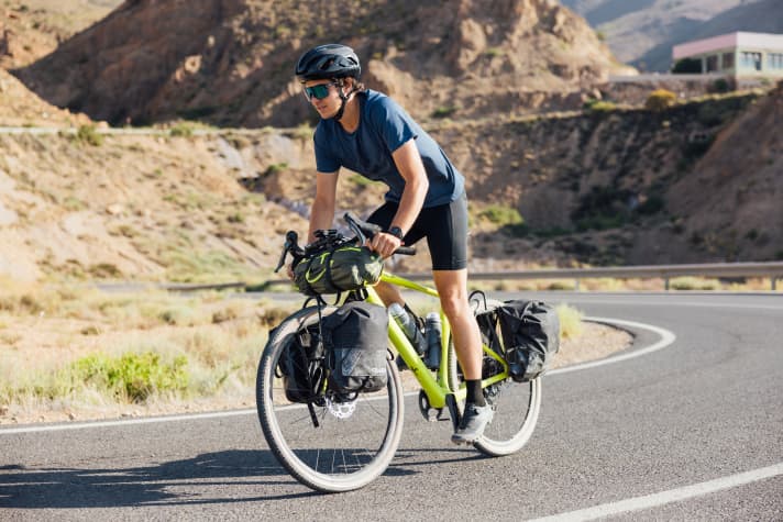The optional pannier rack is supported by the thru axles, and matching bags from Miss Grape round off the package.