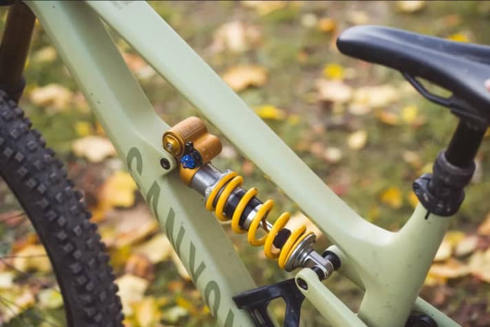Steel spring shock absorbers, such as this model from Öhlins, usually cope better with heavy rider weights.