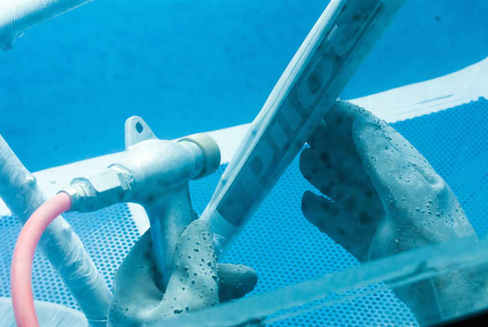   The irradiation box is bombarded by sand like a Sahara storm, and any living creature would die within seconds. The titanium doesn't mind. It just shimmers a little rougher in the irradiated areas.