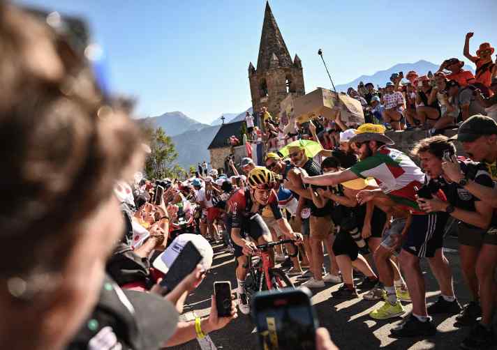 Thomas Pidcock (INEOS Grenadiers) rides towards his first Tour de France stage win after Alpe d'Huez