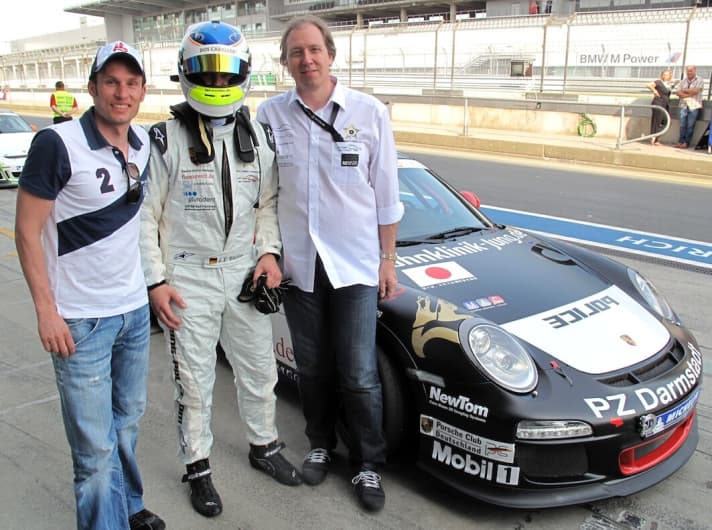   Hanisch and racing drivers Slooten and Jung on the Nürburgring GP circuit.