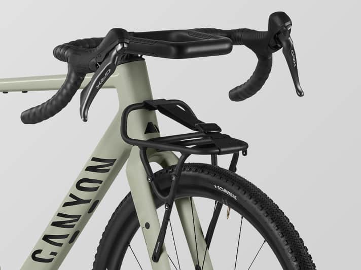 The new Canyon Grizl offers wider tyres, a front pannier rack and a bar on the handlebars