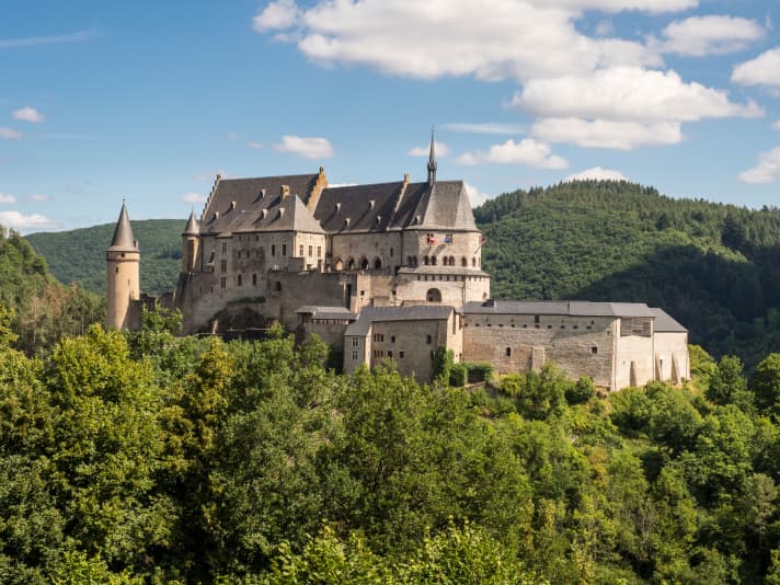 Vianden Castle sits enthroned on a rock above the Our valley.