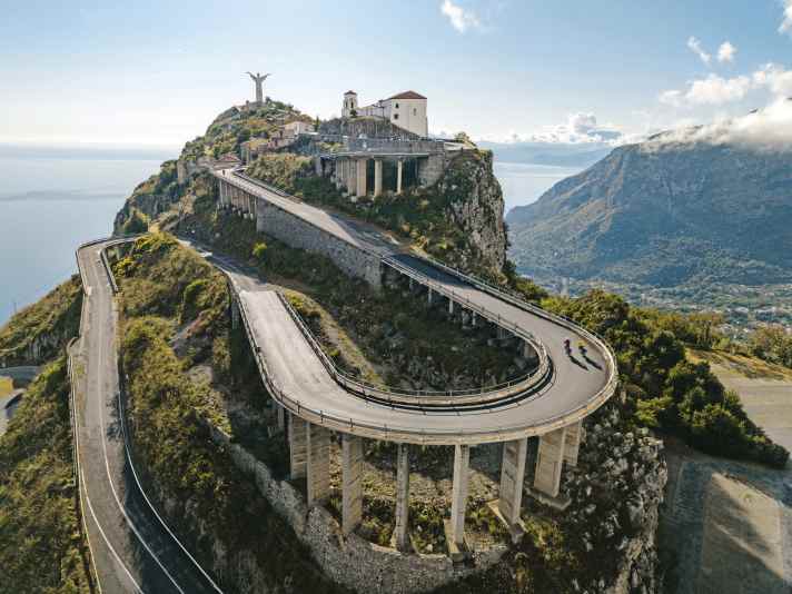The highest point comes at the end: the ascent to the statue of Christ in Maratea via spectacular hairpin bends.