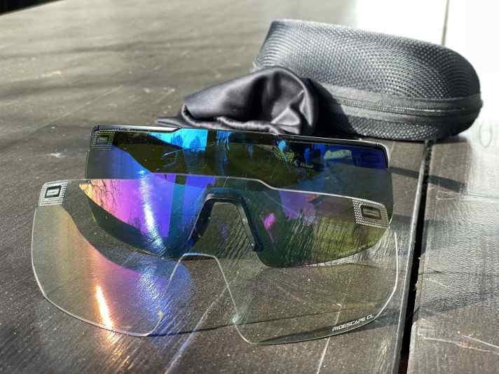 Everything included: case, cloth bag and a clear lens for changing - in case the sun doesn't shine.