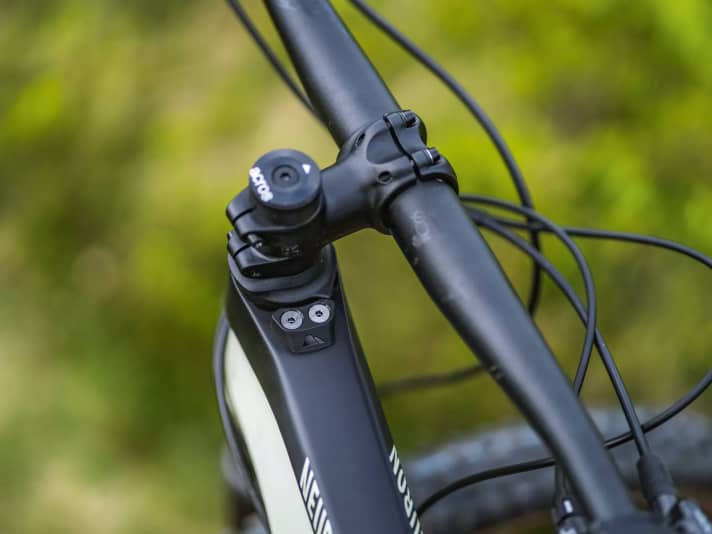 The steering stop limiter protects the Canyon's top tube. On future models, the system will probably be concealed in the headset.
