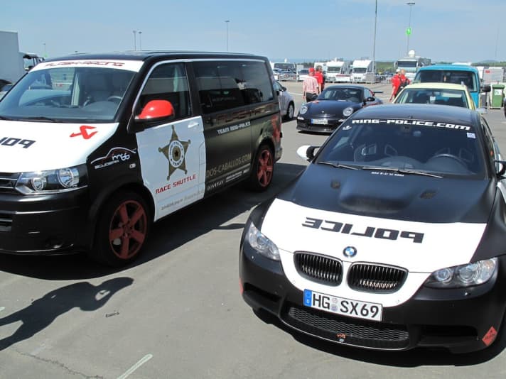   The team's vehicles.