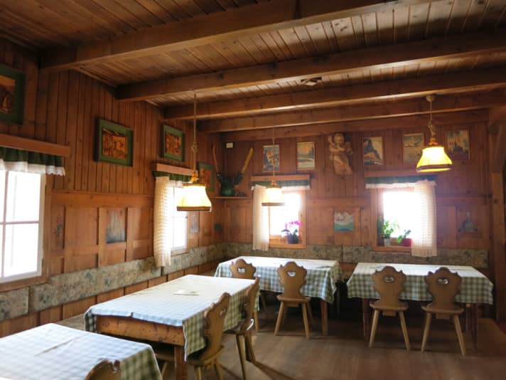   Rustic dining room in the Capanna Cervino at 2084 metres.