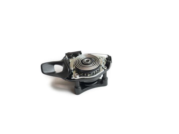A top view of the partially dismantled SRAM gear lever with the mounting aid fitted to the underside.