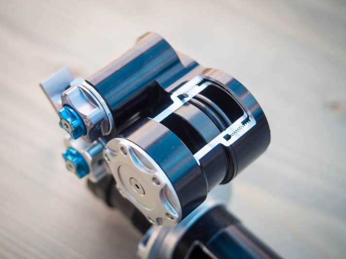   The large expansion tank is designed to protect the damping oil from overheating.