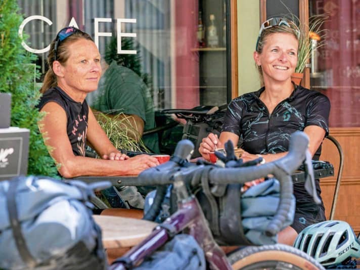 Done: Three days around the north face of the Eiger - the gravel bikers have earned a break at Café Velo.