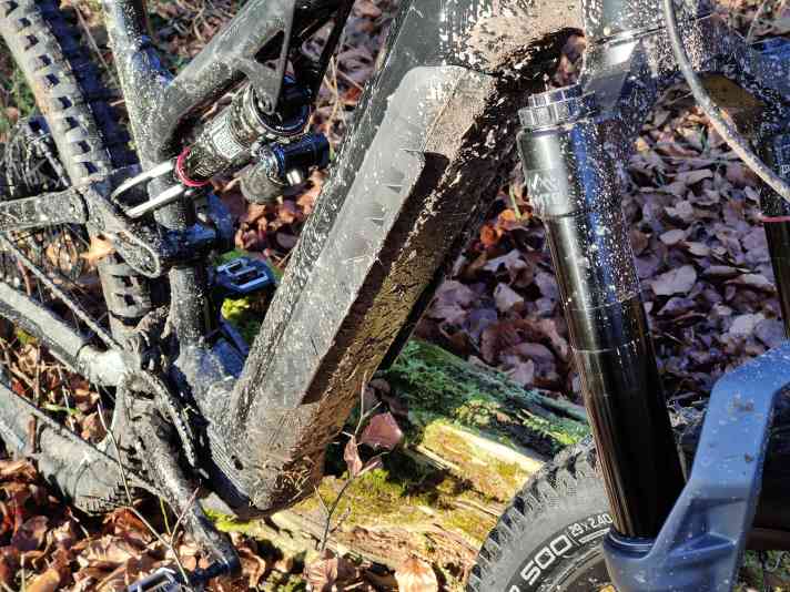 The battery is permanently installed and the plastic cover is fastened with screws.