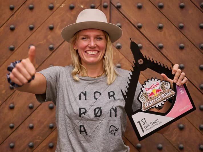Kathi Kuypers is delighted to receive the "1st ever female" award at the Red Bull District Ride 2022 