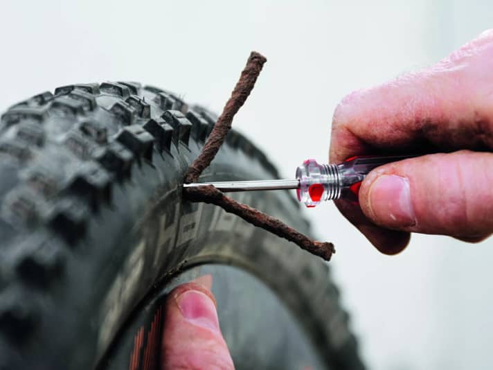 Sealing holes in MTB tyres