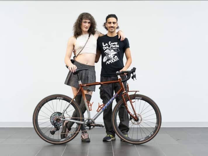Éliane Trudeau and Ronny Perez Jaramillo with the second bike they brought to Bespoked. They were particularly impressed by the playful cable routing tube wrapped around the top tube.
