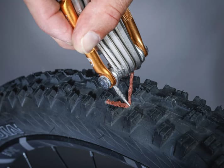With a little pressure, the repair plug slides into the hole.