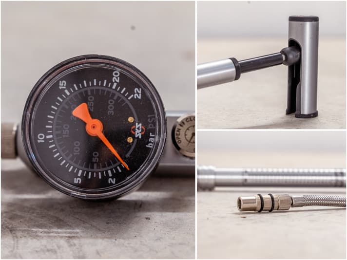 Large pressure gauge - unfortunately with internal psi scale. The folding handle makes it easy to pump. The plastic panelling over the piston rod does not look very high quality. The valve head has a decoupler