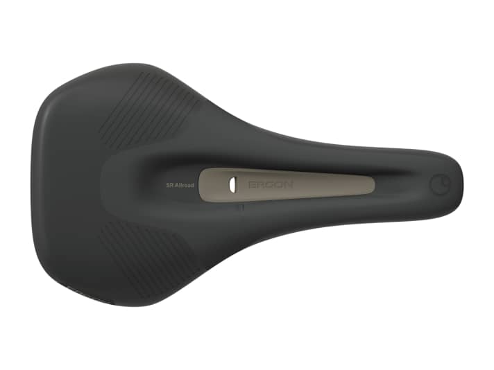 Weather protection: The extra-large relief channel in the women's saddle can be sealed with an insert to protect against splashing water when it rains. A small recess remains so that water can drain away.