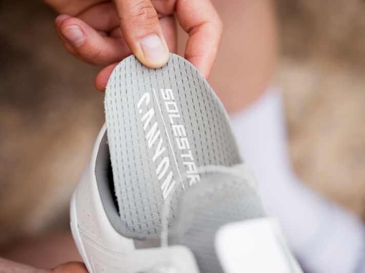 On the Solestar insole, the foot should still be able to move naturally in the Canyon Tempr CFR shoes.