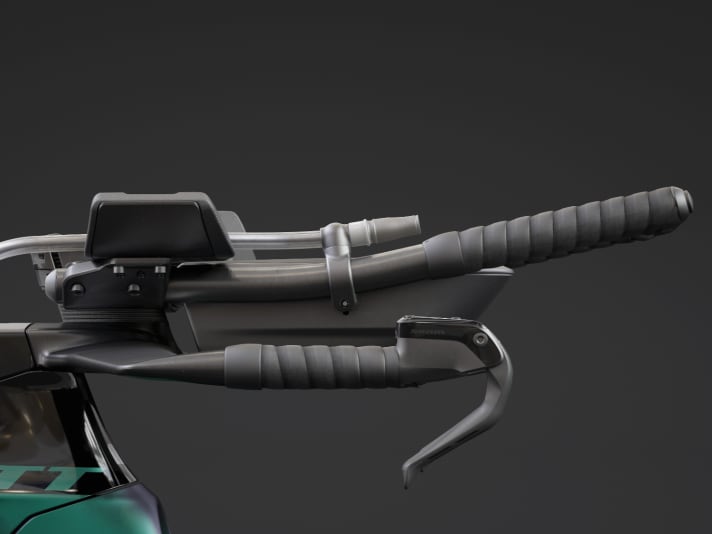 The typical time trial handlebar with supports for the forearms requires practice